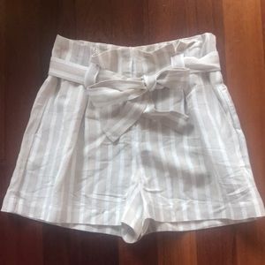 Never worn! New with tags! Flowy high waisted striped shorts. Size 2.